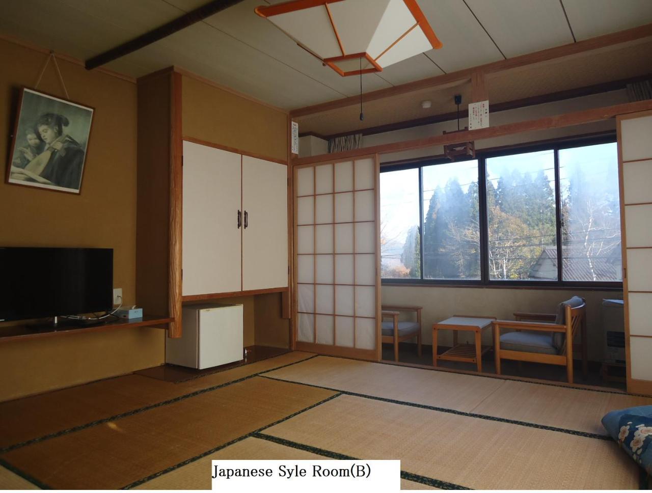 Cafe Cerisier栖里時絵 Hotel Myoko Exterior foto