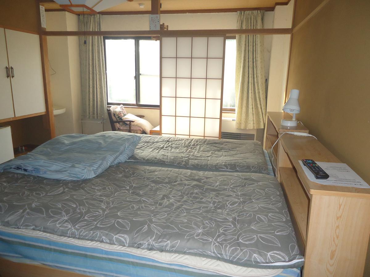 Cafe Cerisier栖里時絵 Hotel Myoko Exterior foto